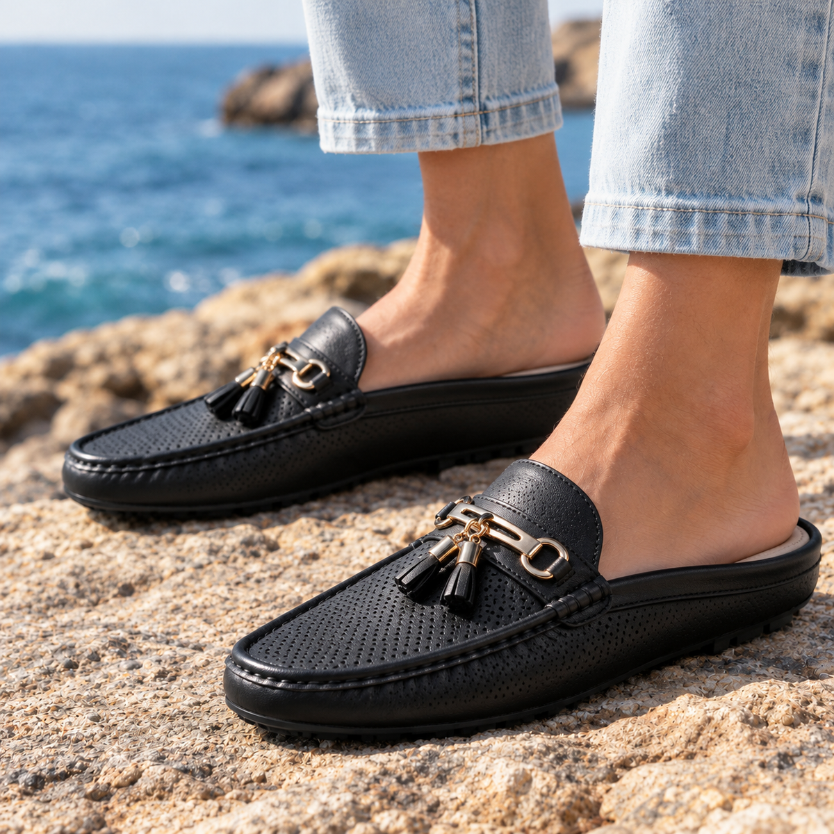 Anna Perforated Tassel Loafer Mules - Black, worn pair