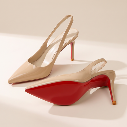 The Margaux slingback heel in Crème, one heel on its side showing the full sole