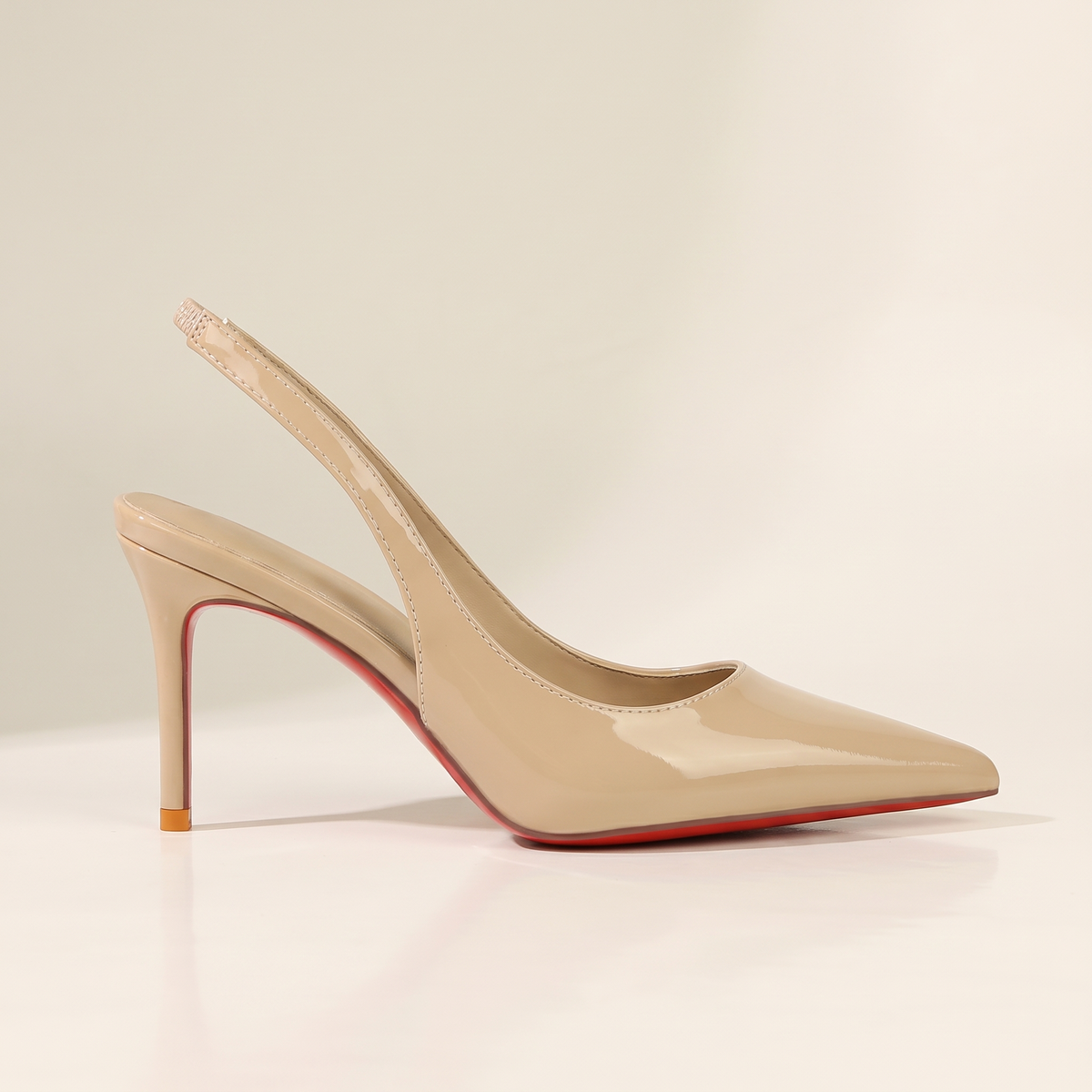 The Margaux slingback heel in Crème, side profile